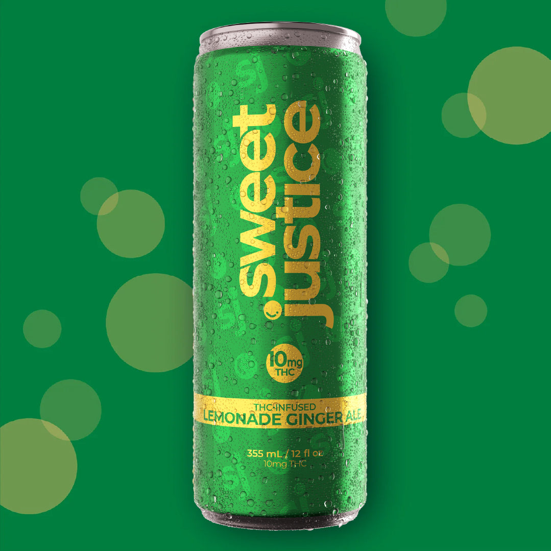 Sweet Justice Lemonade Ginger Ale single can, front label view on green background with bubbles